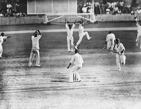 West-Indian team celebrates as Australia's Ian Meckiff is run out with only two balls to go